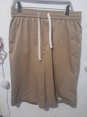 Manfinity XL beige elastic drawstring shorts featuring a white waist cord